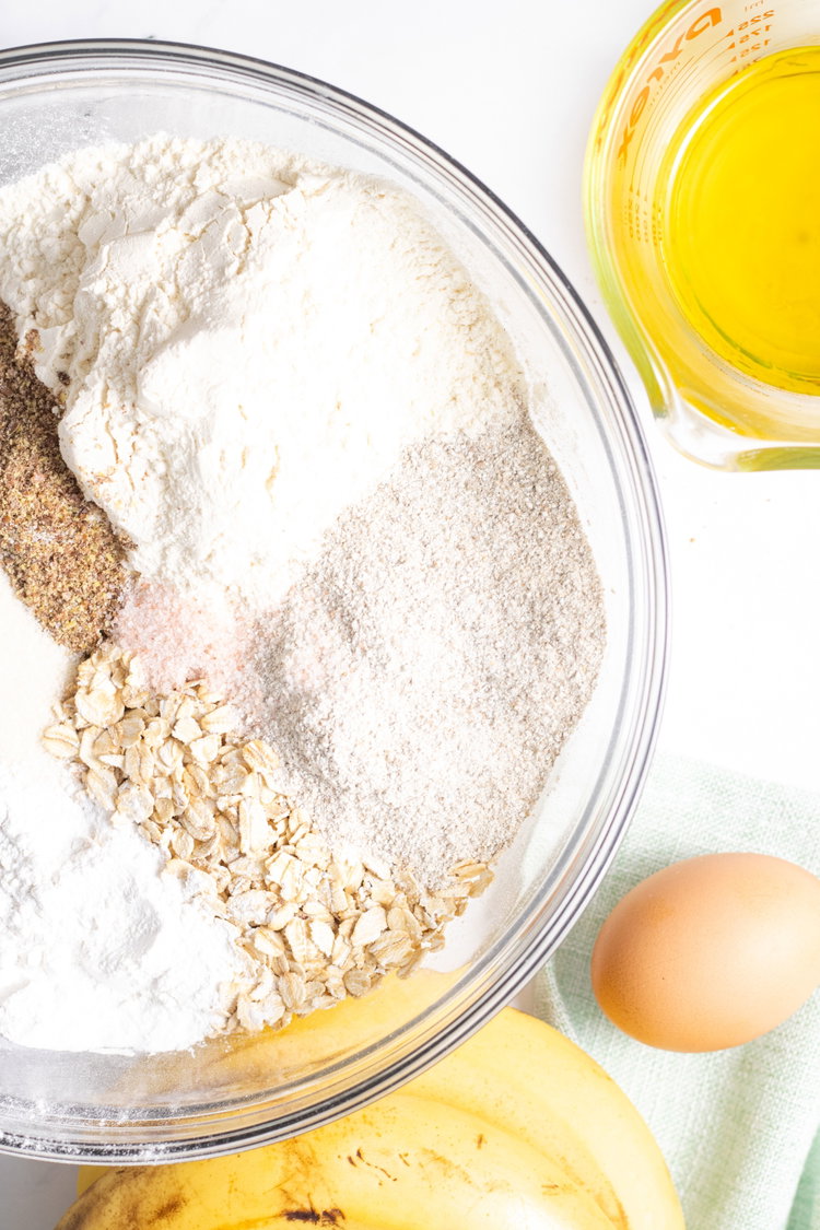 Image of Mix together flours , baking soda, bakingpowder in a bowl.