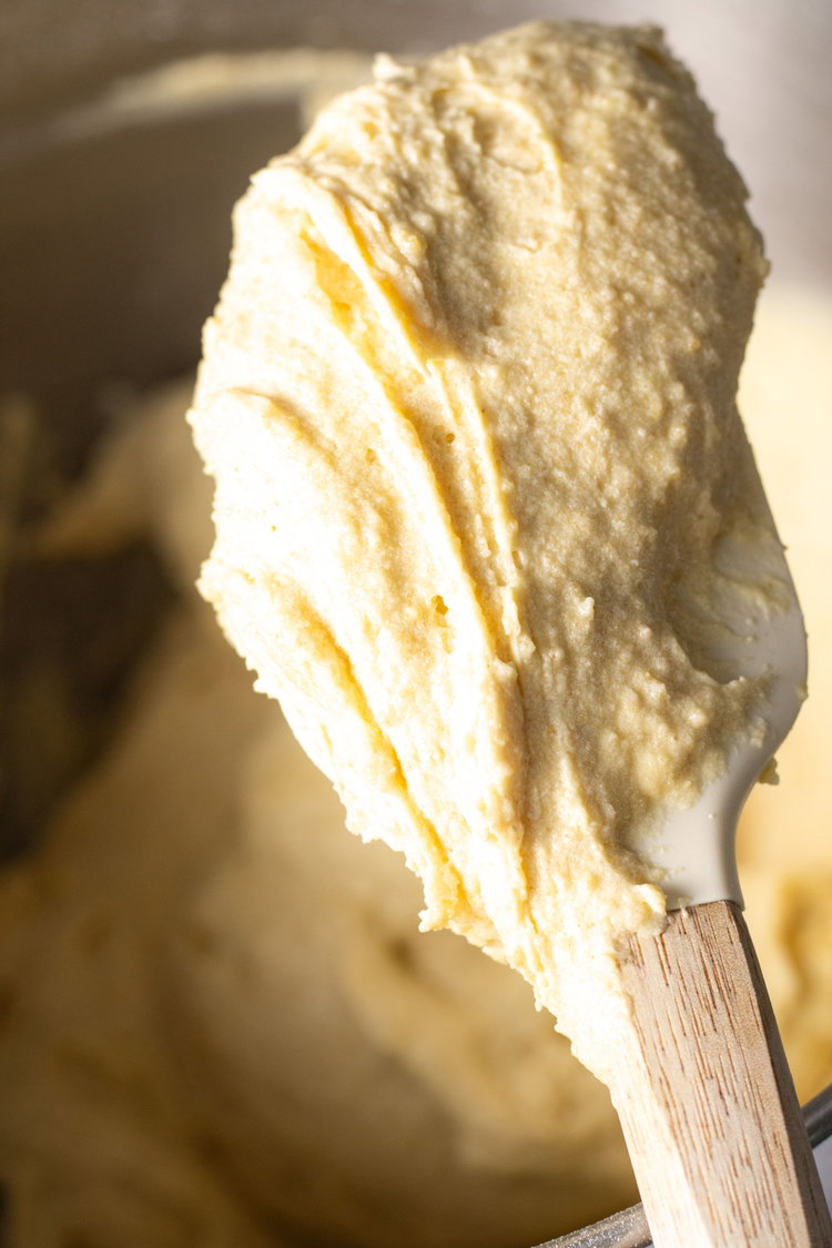 Image of Beat together butter and sugarAdd in eggs and milk