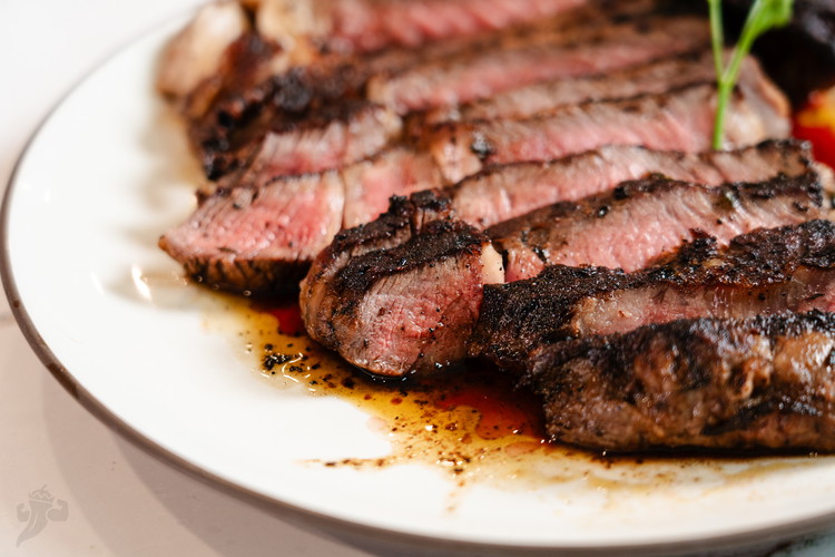 Image of Wrap with aluminum foil and rest the steak 5 minutes per inch of thickness. 