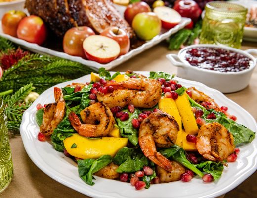 Image of Spinach Salad with Spicy Grilled Shrimp and Pomegranate Seeds