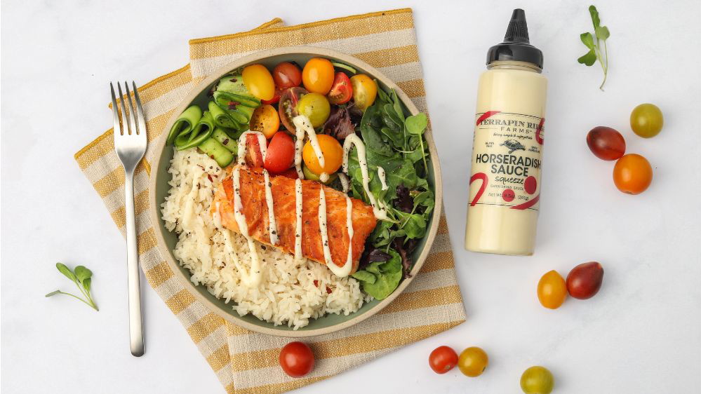 Image of Salmon Bowl with Horseradish Sauce Garnishing Squeeze