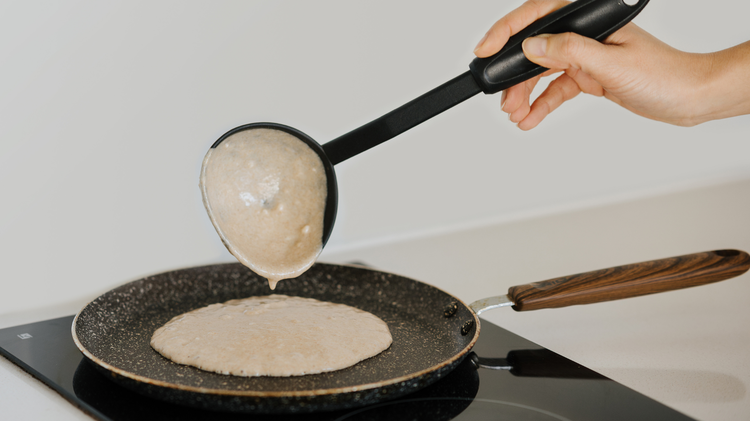 Image of Heat a lightly greased griddle or pan over medium-high heat. Drop batter by the spoonful onto the hot griddle and cook until bubbles form and the edges are dry, 3 to 5 minutes. Flip and cook until browned on the...