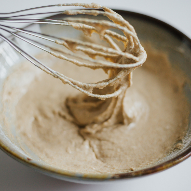 Image of Combine einkorn flour, baking powder, baking soda, and salt in...