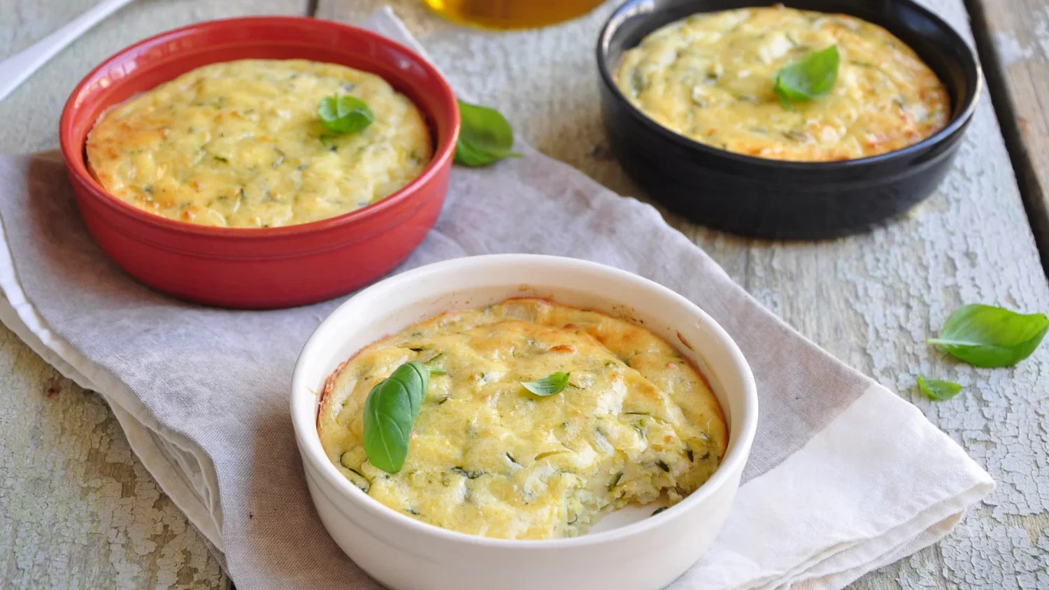 Image of Clafoutis de calabacín, queso feta y albahaca