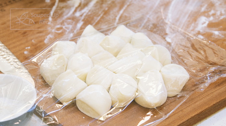 Image of Roll the dough into a long, even log and divide the dough into 18 pieces. I am not using a scale but you can if you want to be precise. Sprinkle some flour to prevent them from sticking to each...