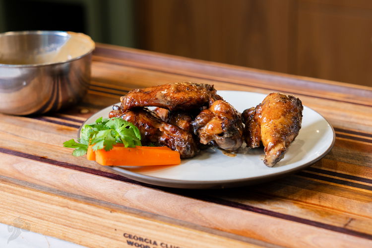 Image of Mix everything together before tossing the wings. Thin with a...