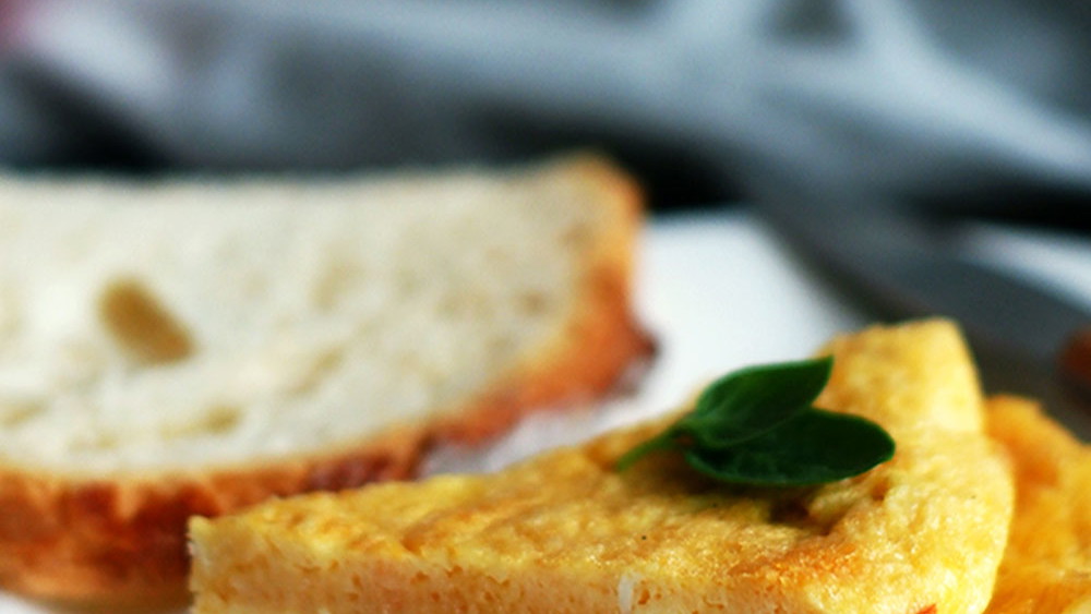 Image of Tortilla tradicional de pan con tomate