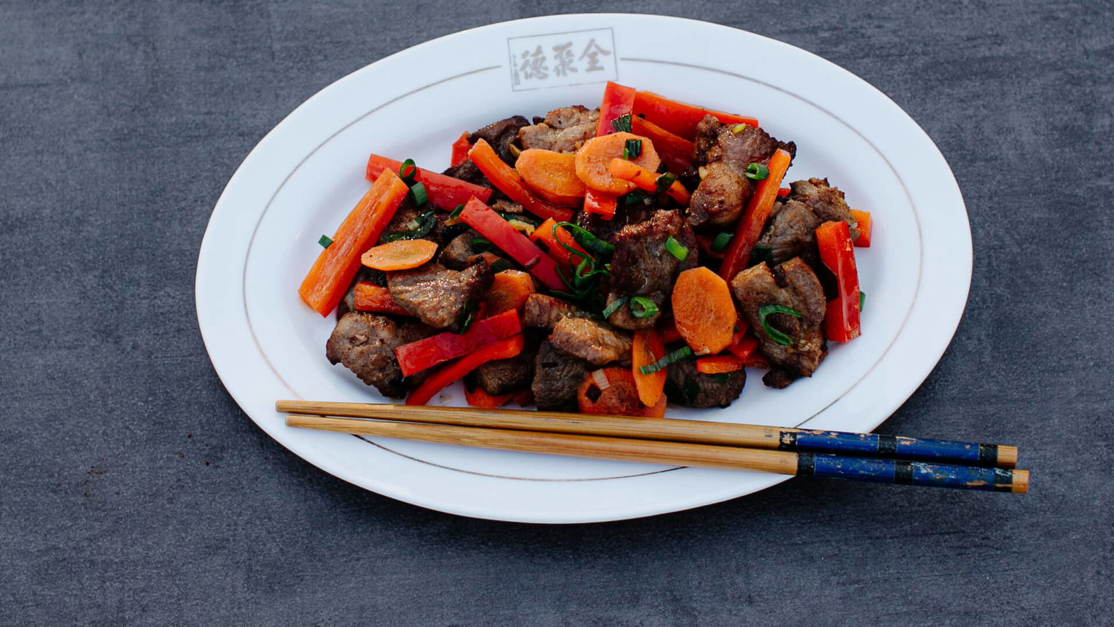 Image of Schweinefleisch aus dem Wok mit Austernsauce - Haoyou Chao Zhurou