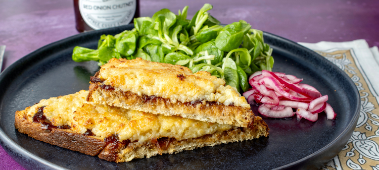 Image of Serve the rarebit toasties hot, with the salad, quick
pickled red onions, and more Tiptree Red Onion Chutney on the side.