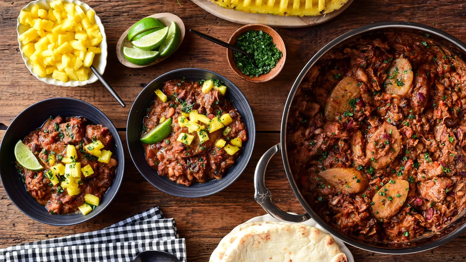 Image of Dutch Oven Baked Beans with Jerk-Spiced Pork Shoulder and Plantains
