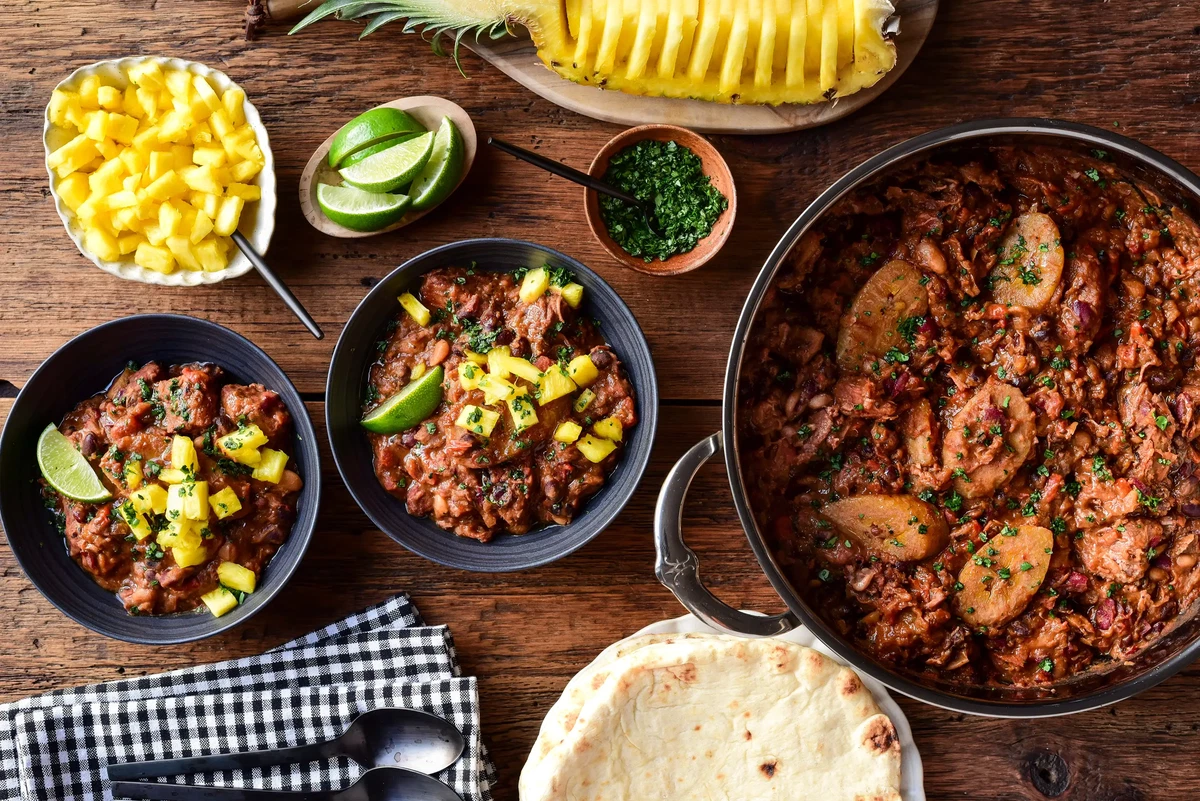 Dutch Oven Baked Beans with Jerk-Spiced Pork Shoulder and Plantains