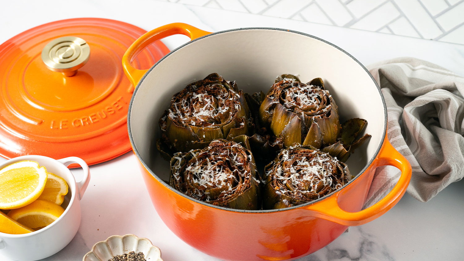 Image of Alcachofas cacio e pepe al horno