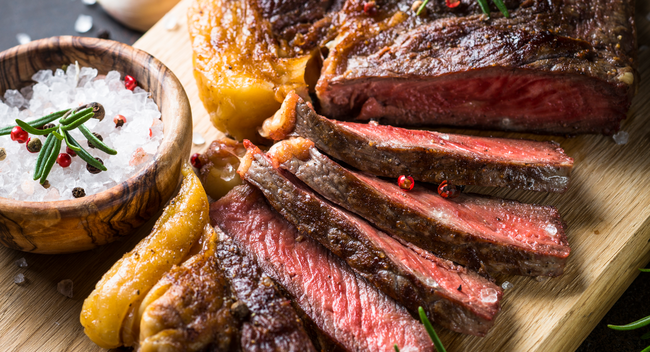 Image of Coffee-Crusted Steak with Roadhouse Rub & Charred Scallion Butter