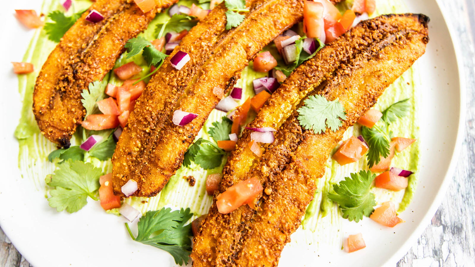 Suya spiced plantain and avocado crema
