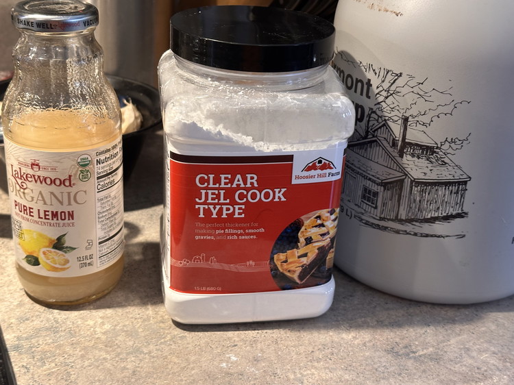 Image of Add water and Clear Jel to a large stock pan over medium heat and whisk together until it creates a pudding-type texture. Immediately add the maple syrup and lemon, whisking to be sure there are no clumps. Continue to cook...