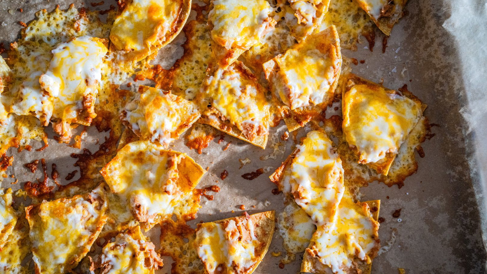Nachos on a baking sheet