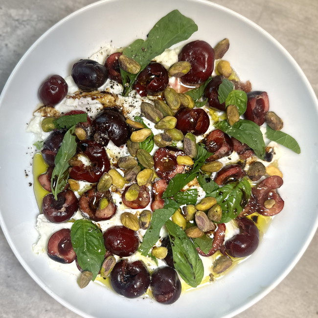 Image of cherry & burrata salad with pistachios