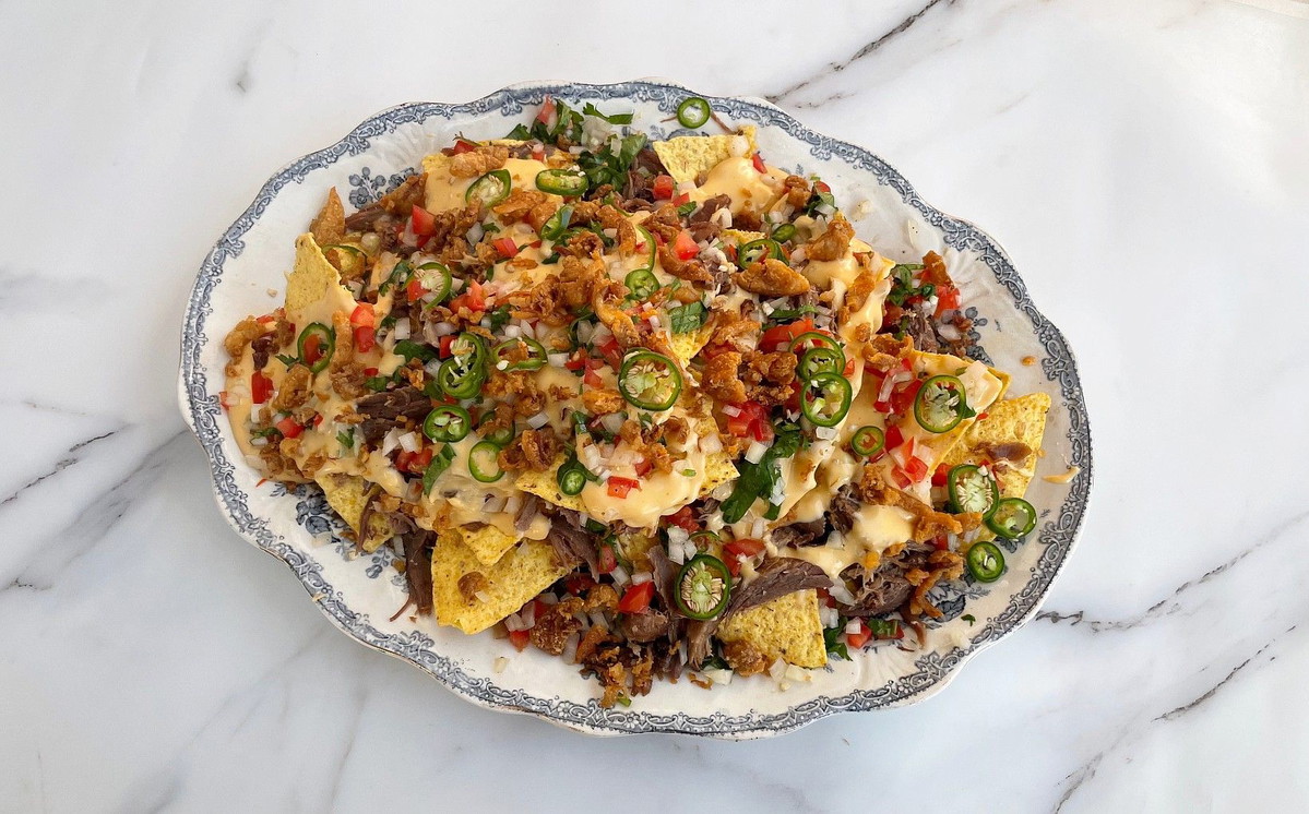 Duck Confit Nachos with Truffle Cheese Sauce and Duck Skin Crackling