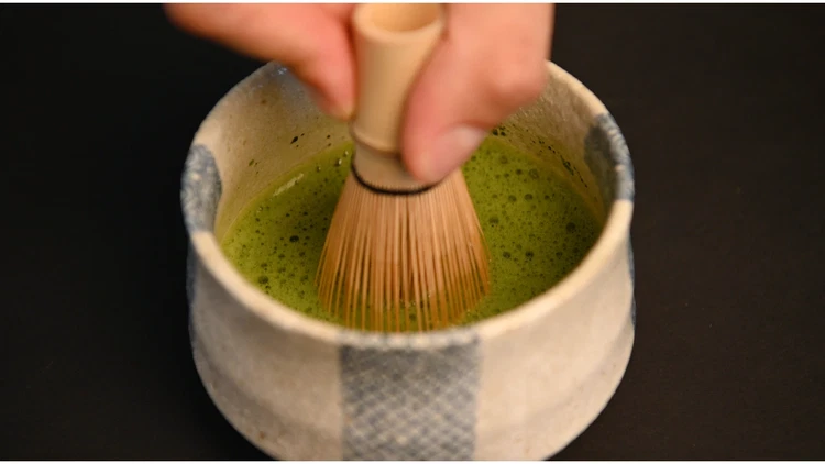 Image of Once you have finished scraping, you can then practice how to whisk matcha. For this, you will want to follow a rapid zigzag motion using mostly your wrist. These small movements may be difficult at first, but you will master...