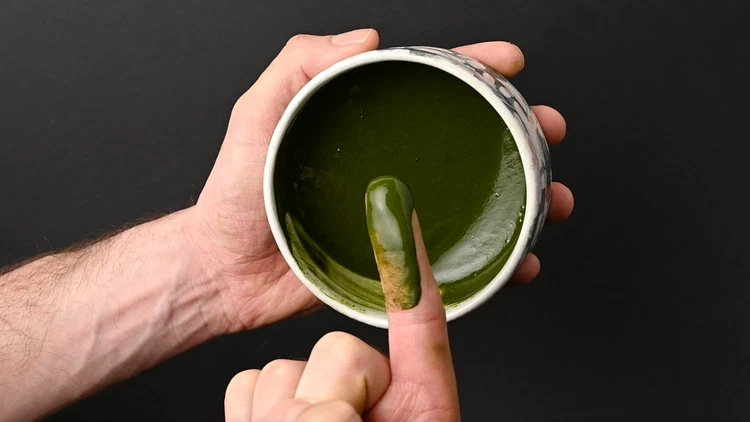 Image of Learning how to make matcha paste is a key step to making a better matcha. Just add in 1 tablespoon of warm water to the bowl and then use your whisk to carefully smooth the matcha out into a paste....