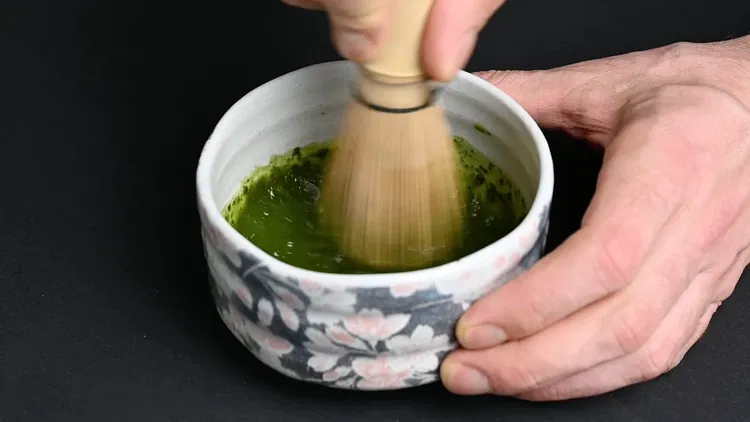 Image of Once the water and matcha powder have been mixed together,...