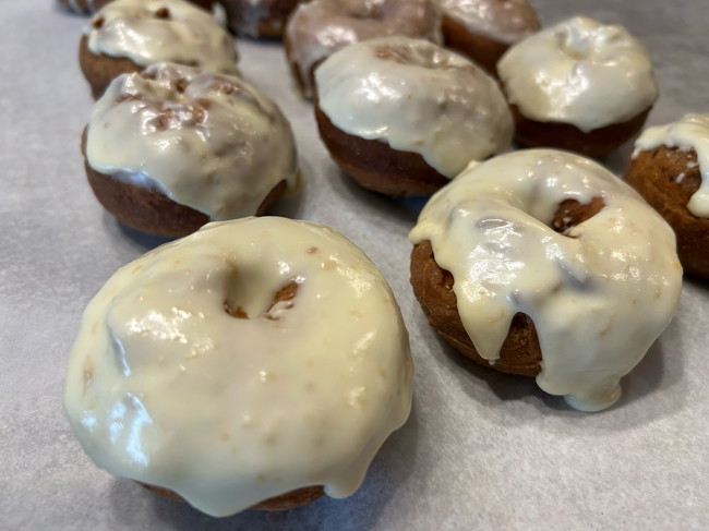 Image of 🎃 Frosted Pumpkin Spice Doughnuts Made With Maple Magic