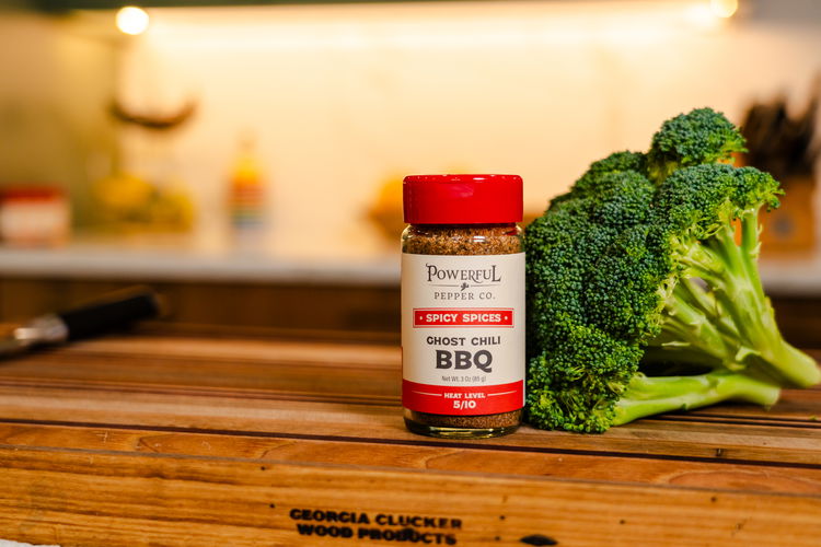 Image of Cut broccoli into florets with stems as long as possible....