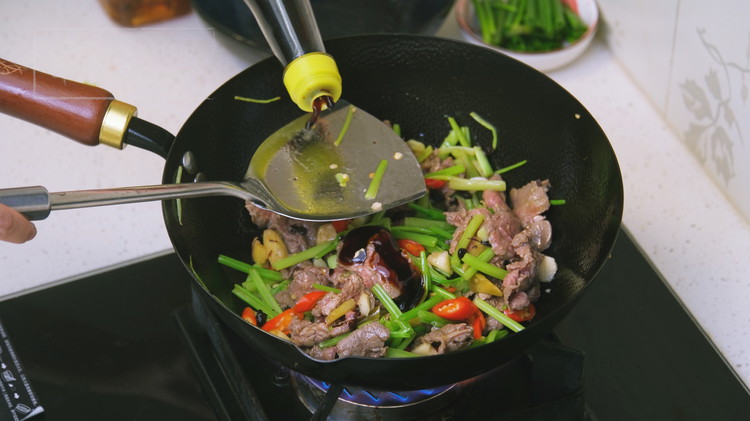 Image of Just simply put the pickled face heavy chilies and the fermented black beans together with all the aromatics and saute for 30 seconds. The rest of the steps are the same. Add the beef and stir over high heat for a...