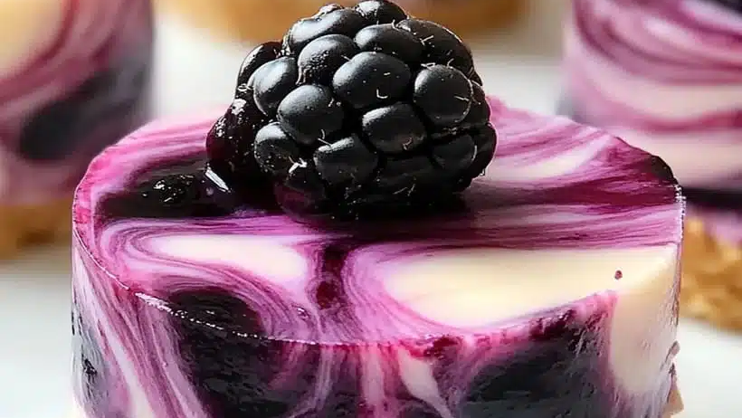 Decadent Blackberry Extract Mini Cheesecakes: Swirled Berry Bliss