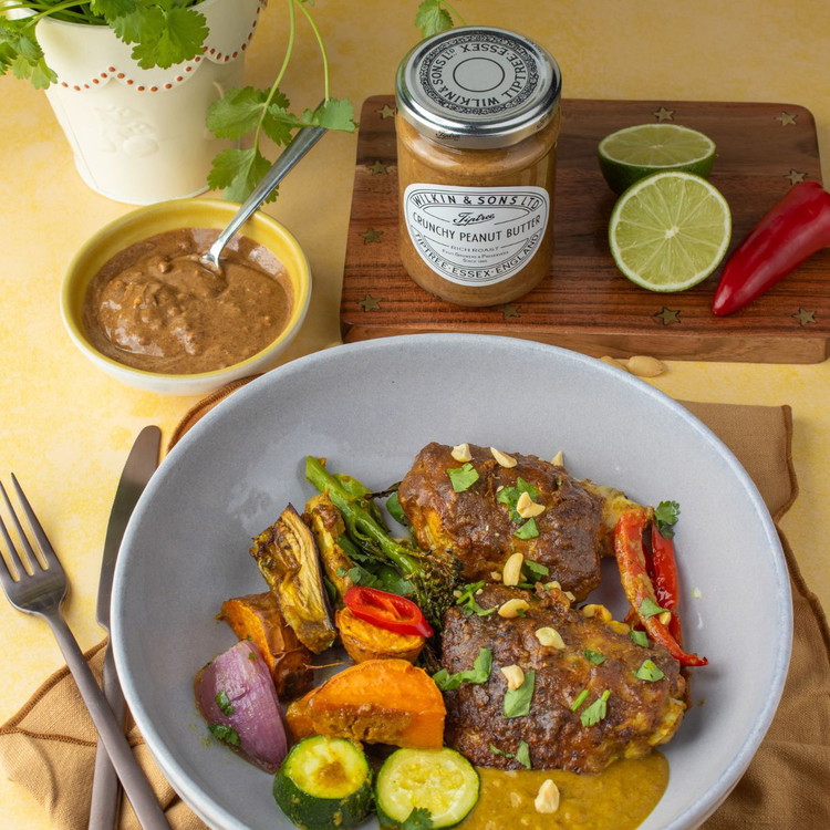 Image of Serve the traybake with some extra satay sauce from the
saucepan.