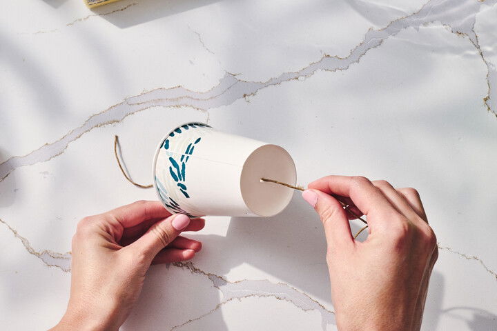 Recipe step 6: CUT a small hole in the bottom of the paper cup...