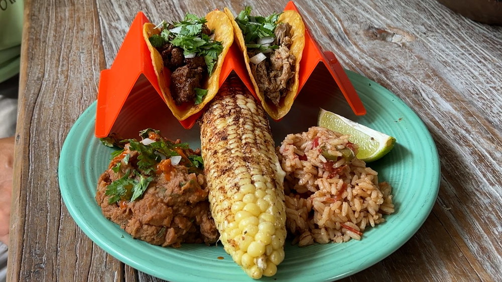 Image of Mexican Fiesta: Slow‑Cooked Carnitas Street Tacos with Mexican Rice & Refried Beans