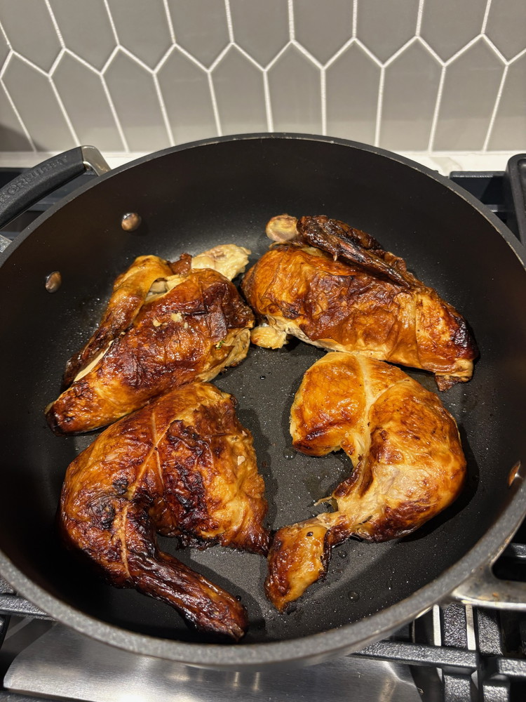 Image of Prep the Chicken: Break down the rotisserie chicken into individual pieces. Heat olive oil in a skillet over medium-high heat. Sear the chicken pieces for 2–3 minutes per side until golden brown and crispy.