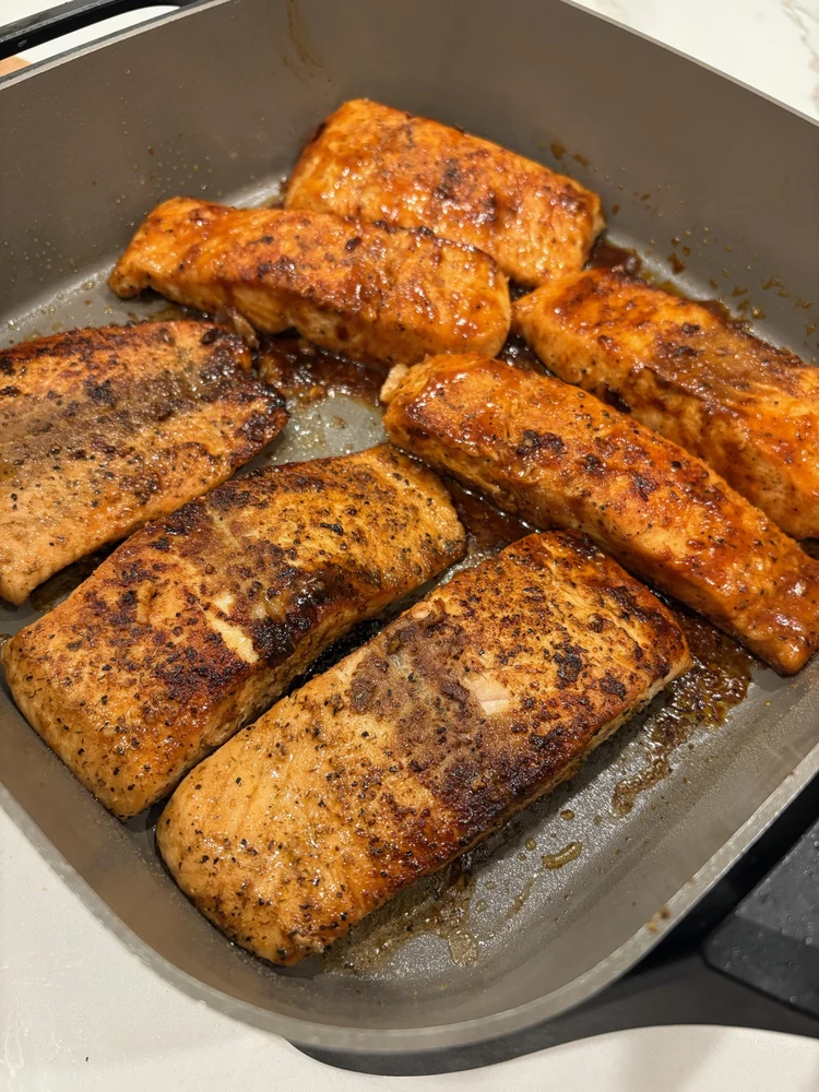Image of Pan-Sear: Heat a large non-stick skillet over medium-high heat. Place salmon skin-side down and sear for 4–5 minutes without moving, until skin is crispy. Flip and cook another 2–3 minutes, until salmon flakes easily with a fork.