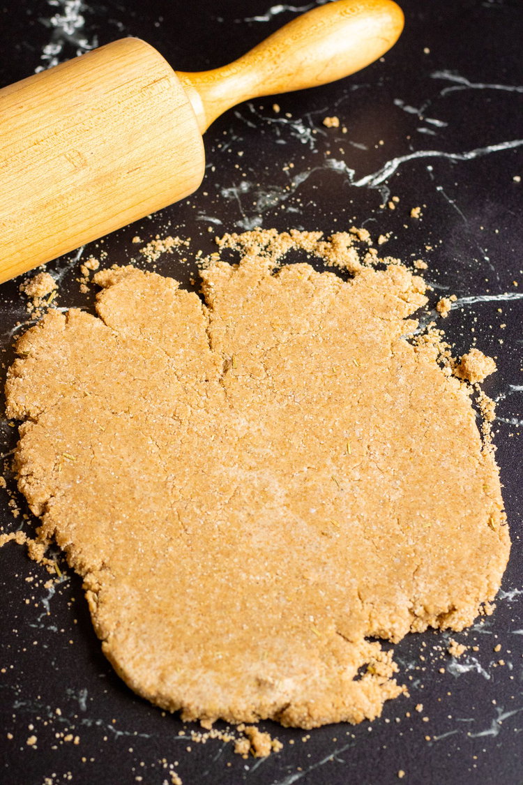 Image of Pour mixture onto a lightly floured surface and knead for...