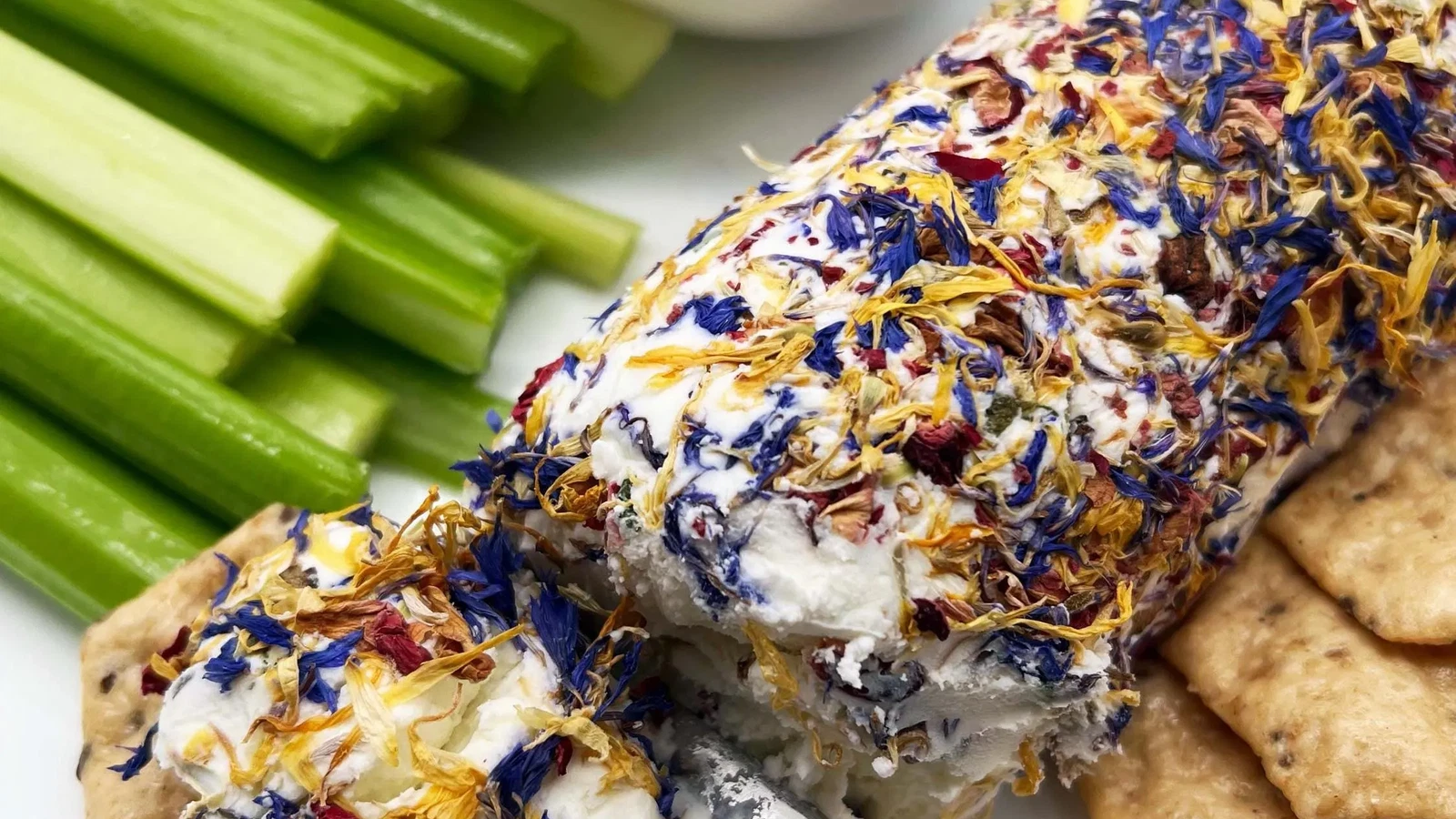 Image of Rocky Mountain Blossom and Fennel Pollen Goat Cheese with crackers and Celery