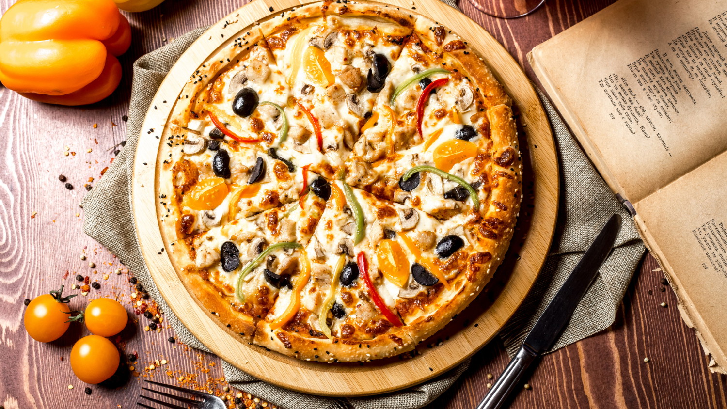 BBQ chicken pizza on a wooden background
