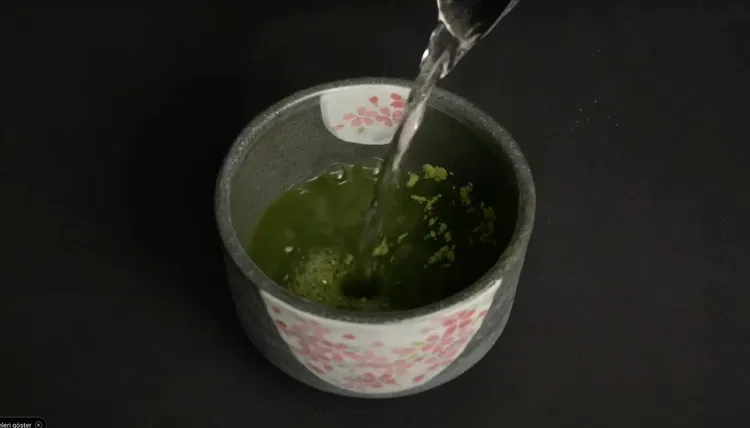 Image of Add 120 ml (½ cup) of the heated water into...