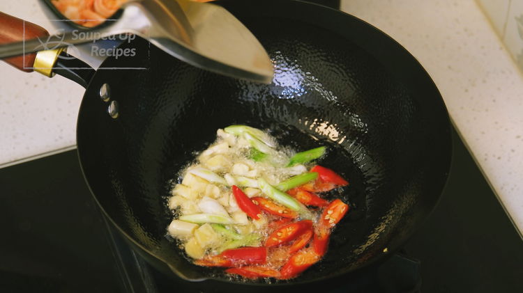 Image of Preheat a wok over medium heat for 20-30 seconds. Add...