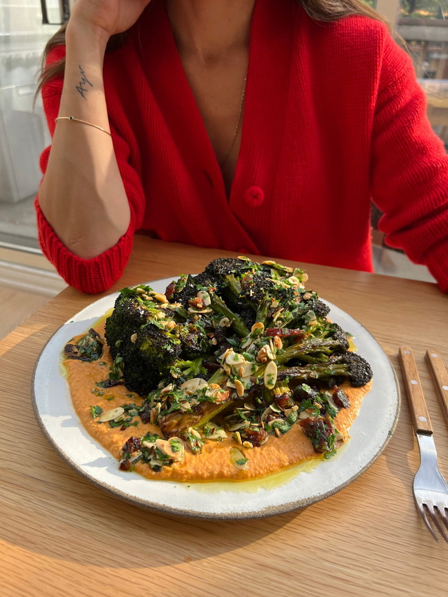 Image of Whole Roasted Broccoli with Romesco, Almonds and Dates