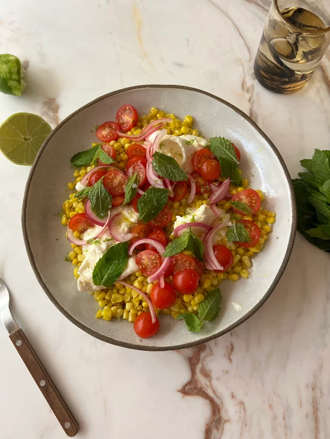 Image of Turmeric Corn Salad with Burrata and Cherry Tomatoes