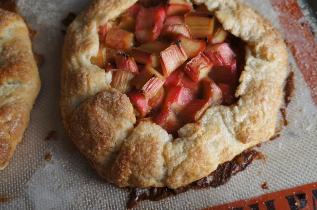 Image of Honey Rhubarb & Pistachio Crostata With Goat Honey & Lemon Cream