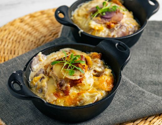 Image of Scalloped Gemstone® Potatoes with Caramelized Hatch Sweet Onions