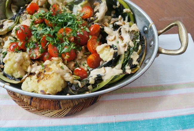 Image of Siniya with Roasted Cauliflower, Preserved Lemon & Tomato Salad