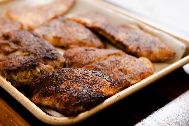 Image of Season fish on both sides evenly with scotch bonnet jerk...