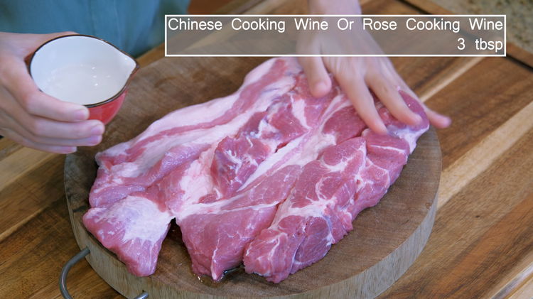 Image of Rub the pork with Chinese cooking wine for a few minutes...