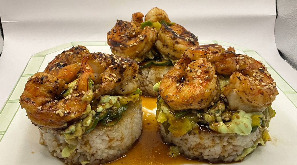 Shrimp & Avocado Tower on Crispy Rice with Wasabi Crema