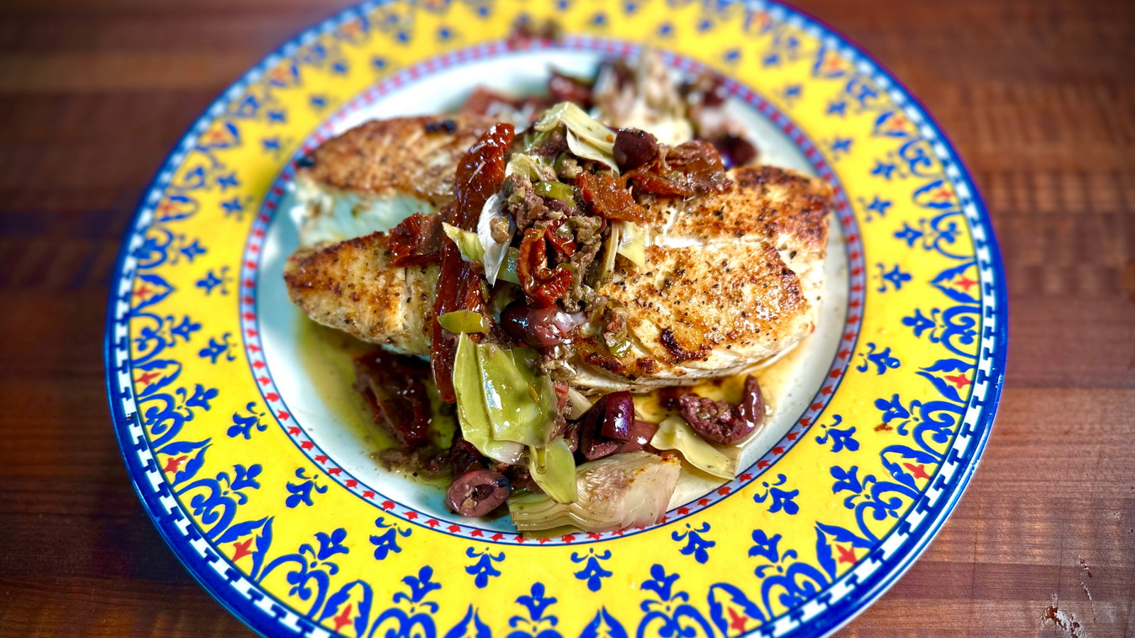 Image of Griddle Halibut with Mediterranean Olive–Artichoke Topping