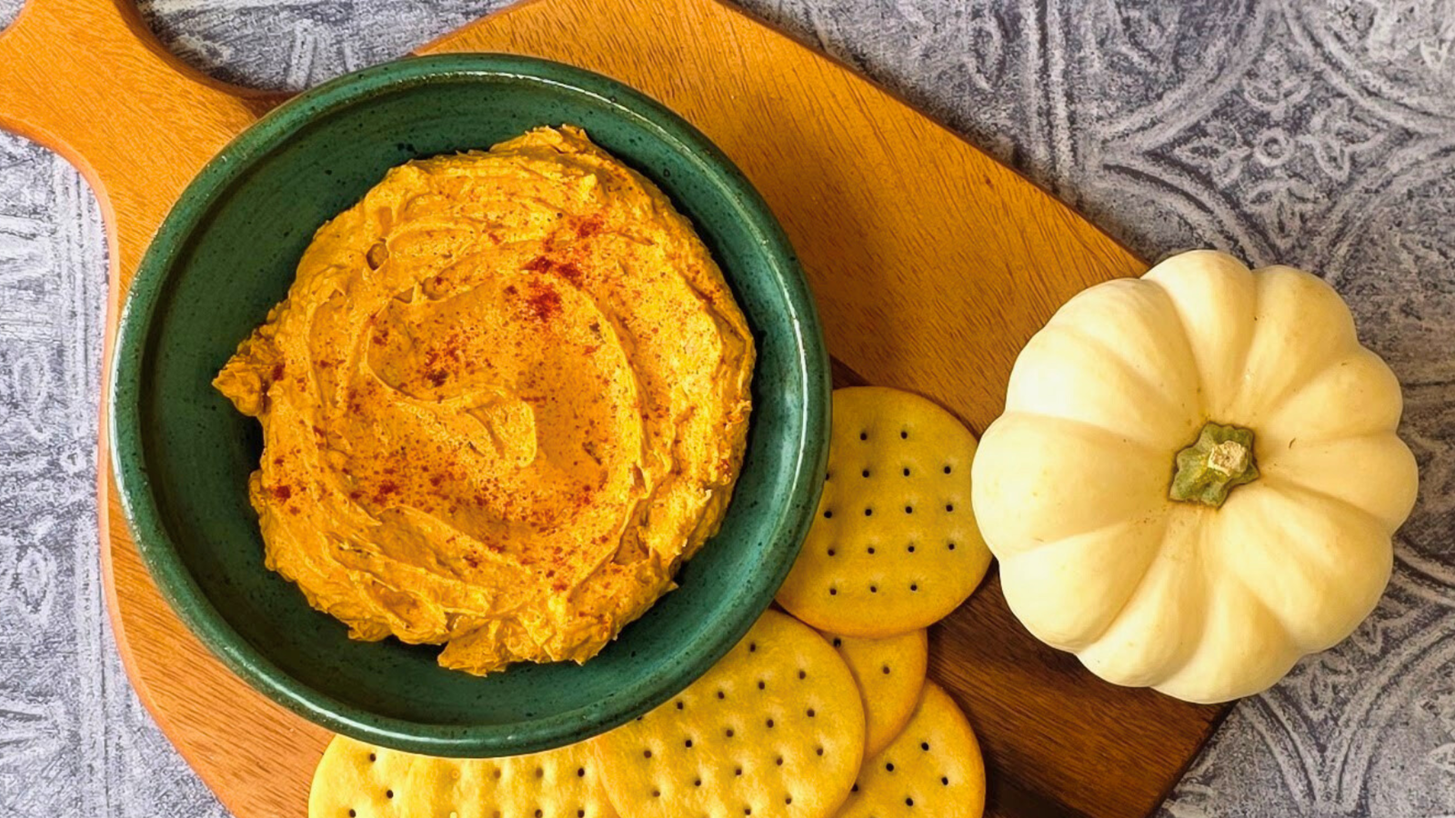image of savory pumpkin dip with crackers made with Bravado Spice Arbol and Garlic Seasoning