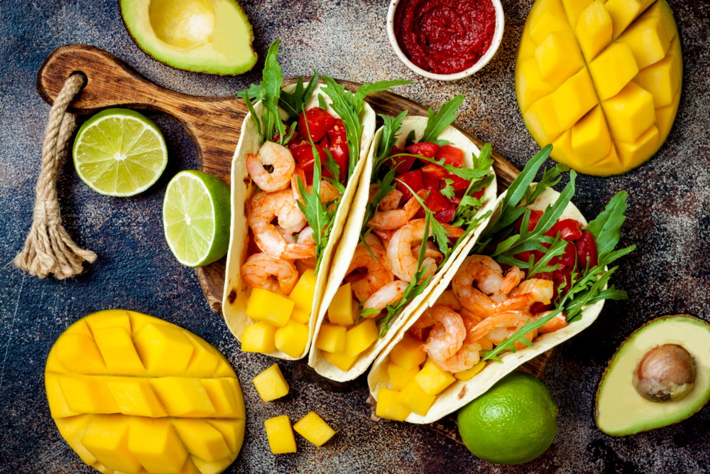 Grilled Prawn Skewer Tacos with Mango-Tomato Slaw 